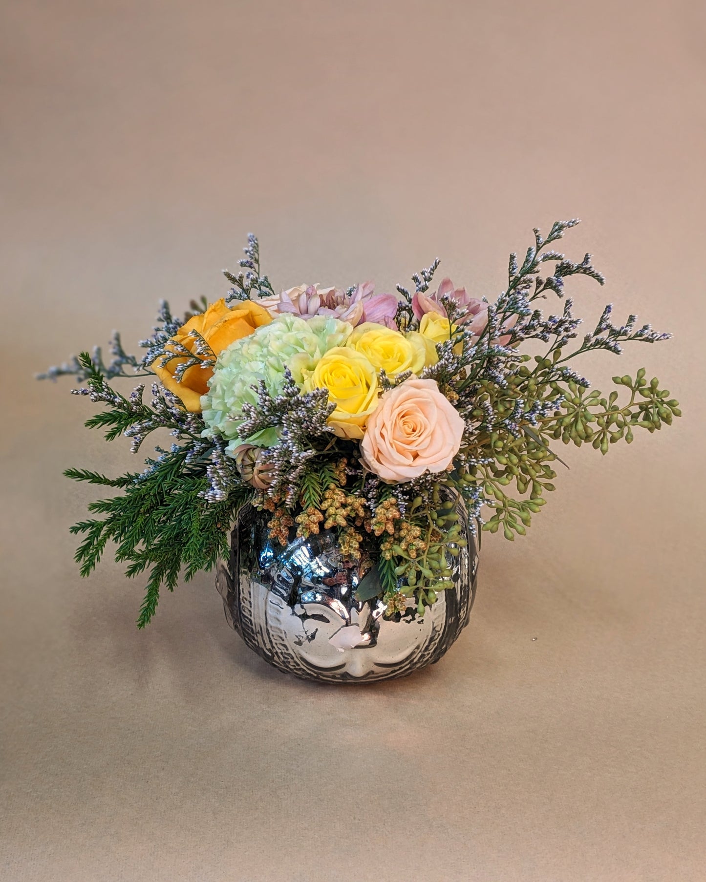 Arrangement in a Mercury Glass Style Vase