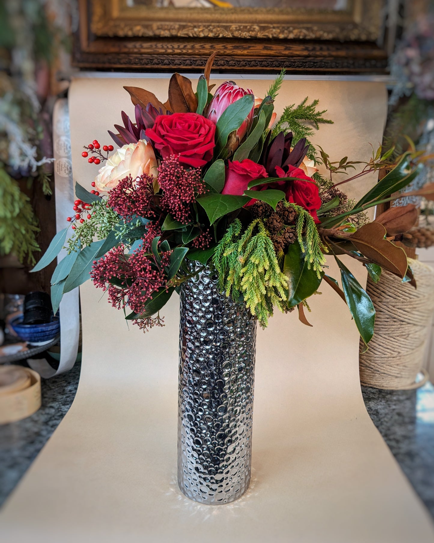 Arrangement in a Hammered Silver Cylinder