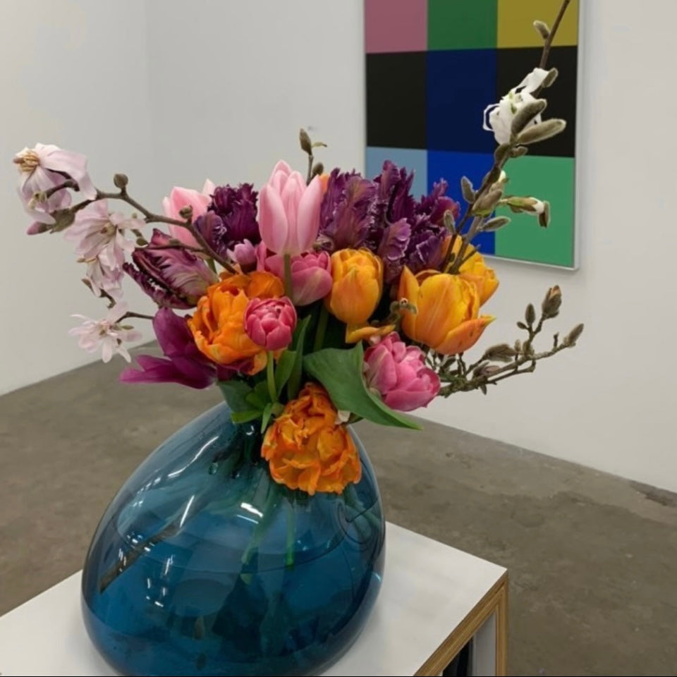 A Seasonal Display in Big Blue Rock Glass Vase Arrangement